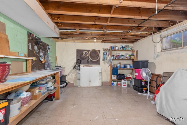 119 Bristol Ave NW, Grand Rapids, MI 49504 - unfinished basement featuring tile patterned floors and washer / clothes dryer