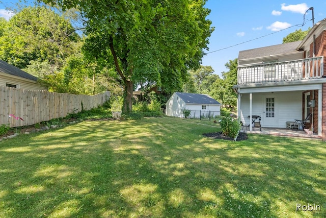 119 Bristol Ave NW, Grand Rapids, MI 49504 - view of yard featuring a patio and a balcony