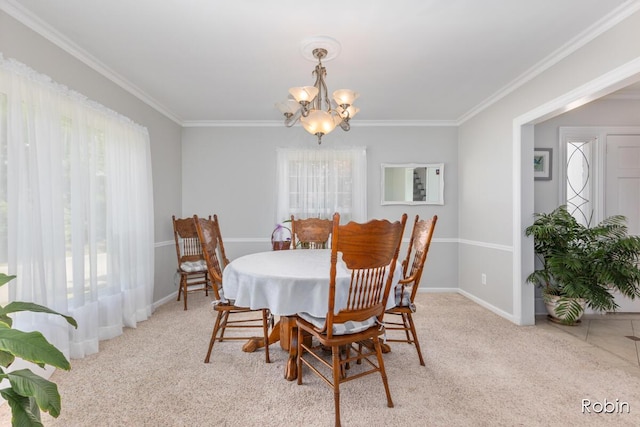 119 Bristol Ave NW, Grand Rapids, MI 49504 - carpeted dining area featuring a chandelier, plenty of natural light, and ornamental molding