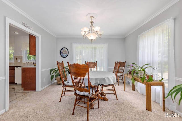 119 Bristol Ave NW, Grand Rapids, MI 49504 - dining room featuring a chandelier, light carpet, and ornamental molding