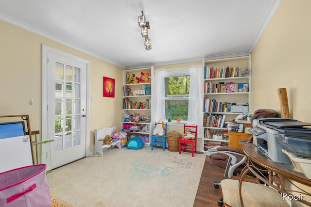 119 Bristol Ave NW, Grand Rapids, MI 49504 - rec room featuring crown molding and wood finished floors