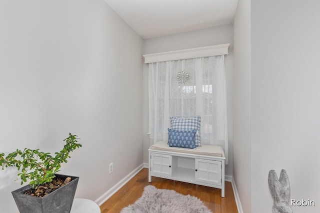 119 Bristol Ave NW, Grand Rapids, MI 49504 - sitting room with wood finished floors and baseboards