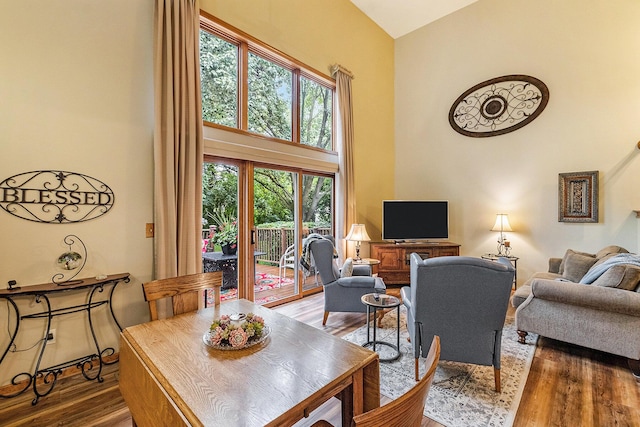 9379 Jamie Dr, Davison, MI 48423 - living area featuring wood finished floors, a high ceiling, and healthy amount of natural light