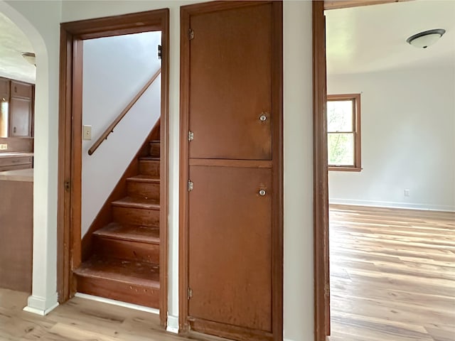 2839 128th Ave, Holland, MI 49424 - stairs with wood finished floors and arched walkways