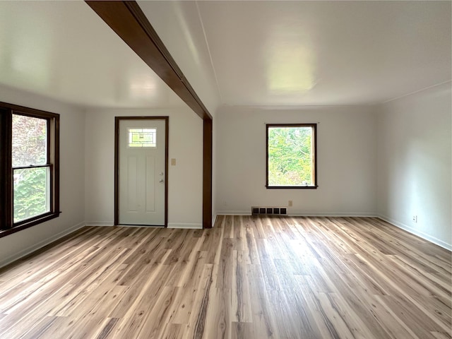 2839 128th Ave, Holland, MI 49424 - foyer entrance with healthy amount of natural light and light wood-style flooring
