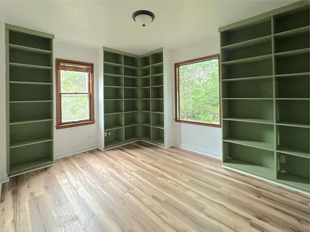 2839 128th Ave, Holland, MI 49424 - unfurnished room with baseboards and wood finished floors