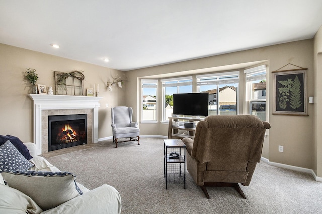 8767 Lilly Dr, Ypsilanti, MI 48197 - living area featuring a tile fireplace and carpet
