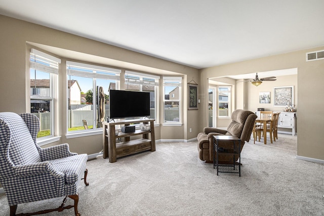 8767 Lilly Dr, Ypsilanti, MI 48197 - living room with carpet floors and a ceiling fan