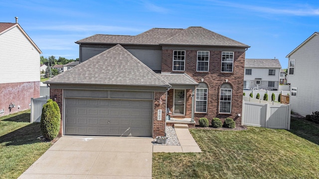 8767 Lilly Dr, Ypsilanti, MI 48197 - traditional-style house featuring a shingled roof, brick siding, concrete driveway, and a garage