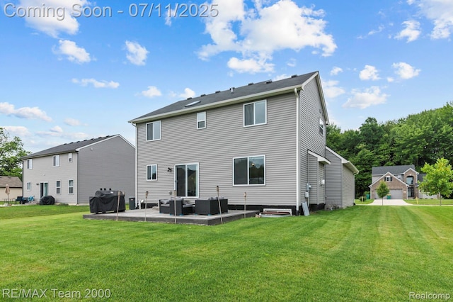 9019 Elbert Dr, Romulus, MI 48174 - rear view of property featuring an outdoor hangout area, a lawn, and a patio area