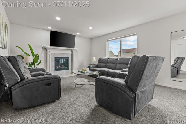 9019 Elbert Dr, Romulus, MI 48174 - living area featuring recessed lighting, carpet flooring, and a tiled fireplace