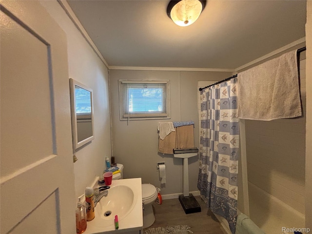 130 Meadle St, Warren, MI 48043 - bathroom featuring ornamental molding, wood finished floors, vanity, and shower / bath combination with curtain