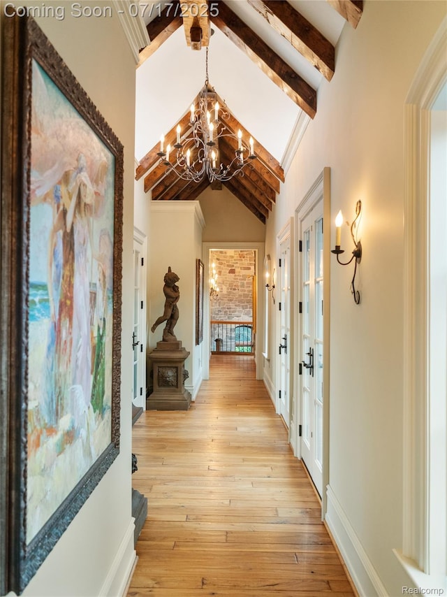 2756 Turtle Bluff Dr, Bloomfield Hills, MI 48302 - corridor with a chandelier, light wood-type flooring, and french doors