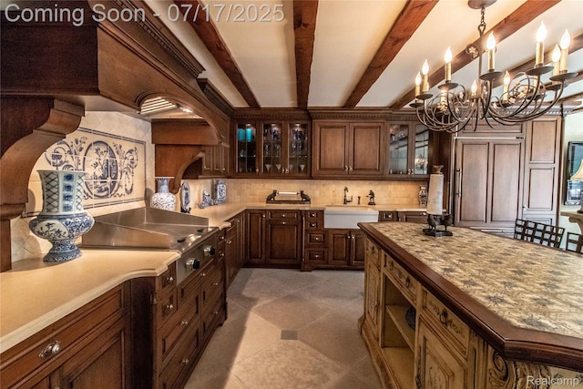 2756 Turtle Bluff Dr, Bloomfield Hills, MI 48302 - kitchen featuring tasteful backsplash, a chandelier, light countertops, beam ceiling, and glass insert cabinets