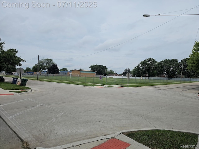 893 Leblanc St, Lincoln Park, MI 48146 - view of concrete road featuring sidewalks and curbs