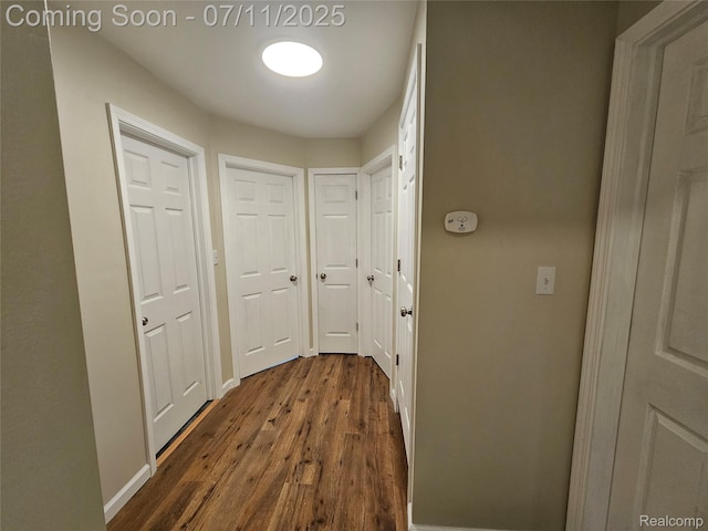 893 Leblanc St, Lincoln Park, MI 48146 - hall featuring dark wood-style floors and baseboards