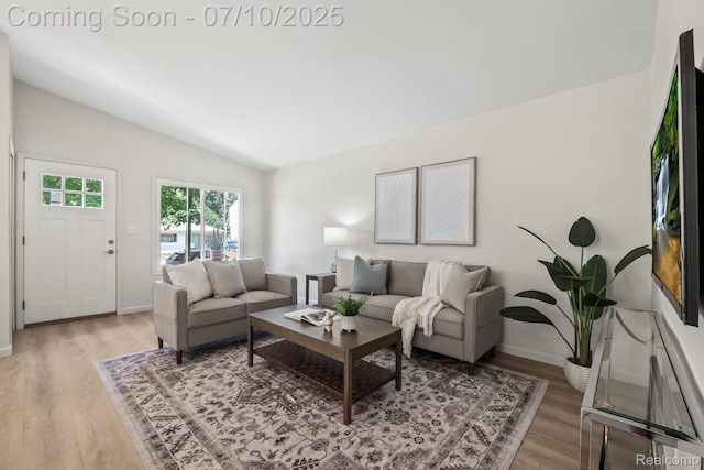 3764 Tyler Ave, Royal Oak, MI 48072 - living room featuring lofted ceiling and light wood finished floors