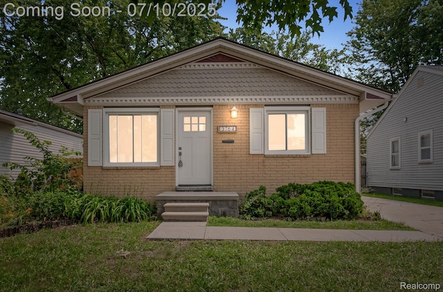 3764 Tyler Ave, Royal Oak, MI 48072 - view of front of home featuring brick siding and a front lawn