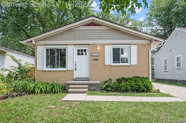 3764 Tyler Ave, Royal Oak, MI 48072 - view of front facade with brick siding and a front yard