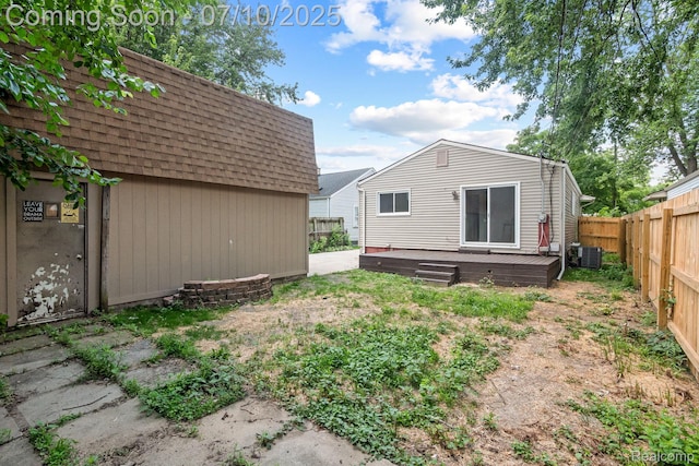 3764 Tyler Ave, Royal Oak, MI 48072 - rear view of property featuring roof with shingles, a deck, and a fenced backyard