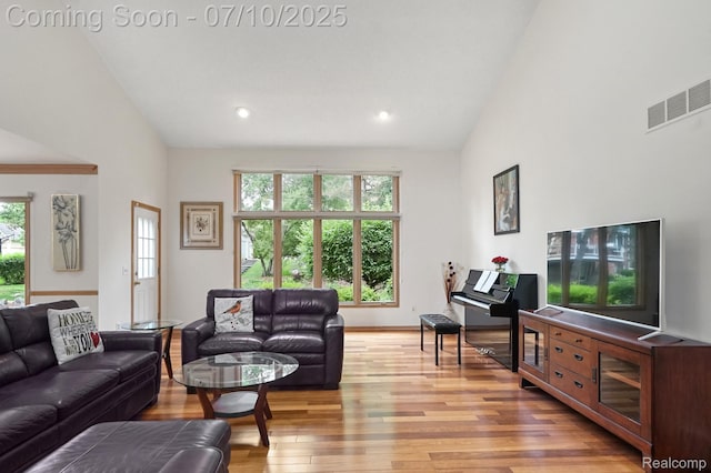4253 Drexel Dr, Troy, MI 48098 - living area with plenty of natural light, light wood-style floors, recessed lighting, and high vaulted ceiling