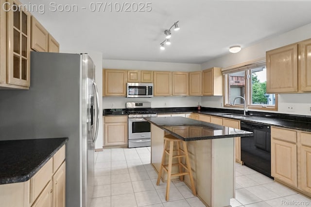 4253 Drexel Dr, Troy, MI 48098 - kitchen with appliances with stainless steel finishes, light brown cabinets, a breakfast bar, a kitchen island, and light tile patterned floors