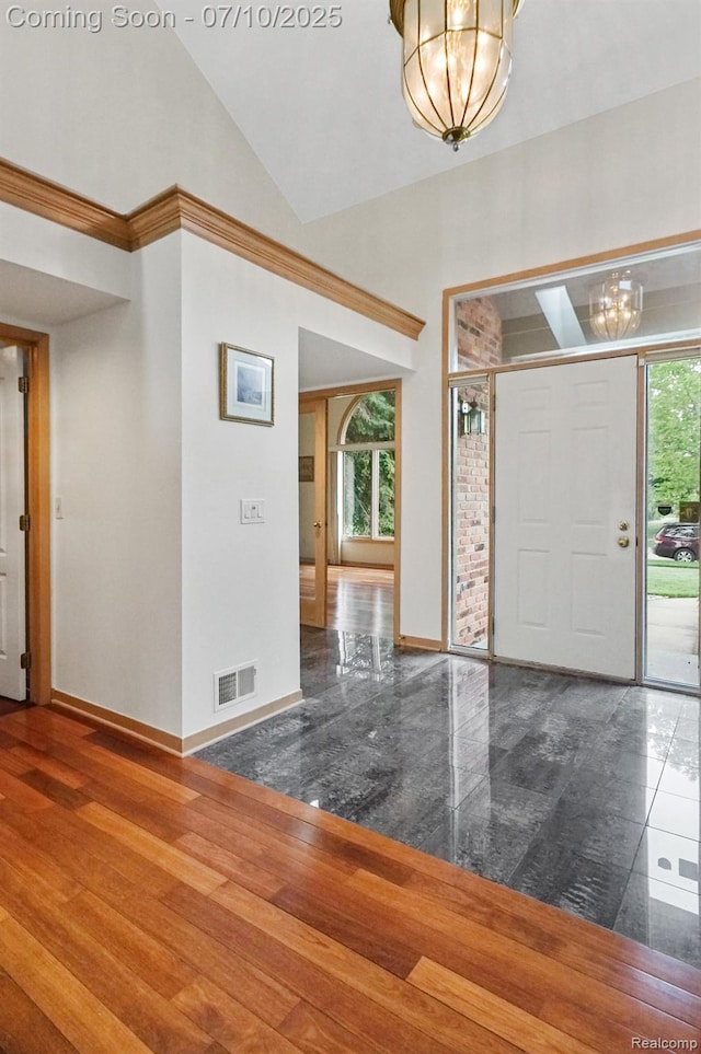 4253 Drexel Dr, Troy, MI 48098 - entryway with a chandelier and high vaulted ceiling