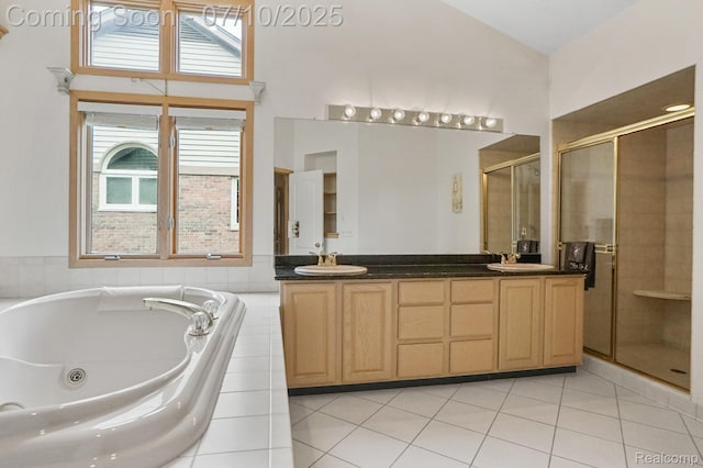 4253 Drexel Dr, Troy, MI 48098 - bathroom with a shower stall, double vanity, a tub with jets, tile patterned flooring, and high vaulted ceiling