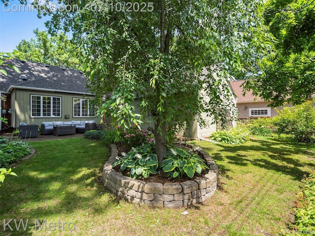 1877 Wiltshire Rd, Berkley, MI 48072 - view of green lawn with outdoor lounge area and a patio