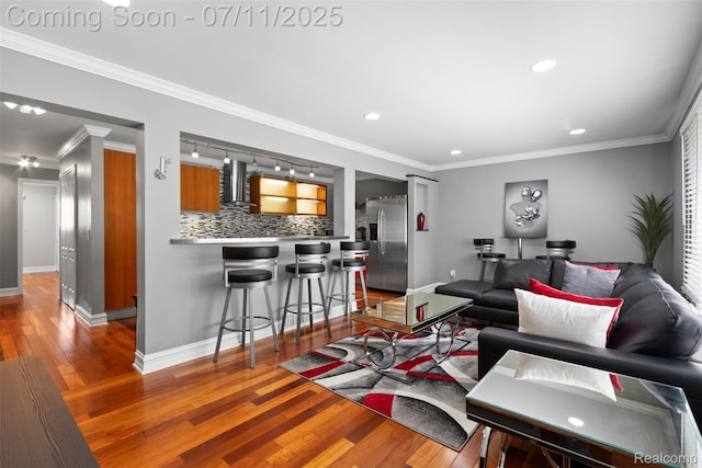 532 E Fox Hills Dr, Bloomfield Hills, MI 48304 - living area featuring hardwood / wood-style floors, recessed lighting, and crown molding