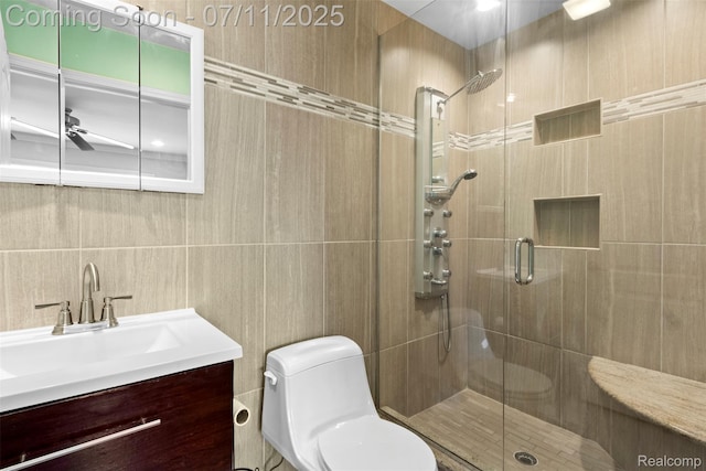 532 E Fox Hills Dr, Bloomfield Hills, MI 48304 - full bathroom with a shower stall, tile walls, and vanity