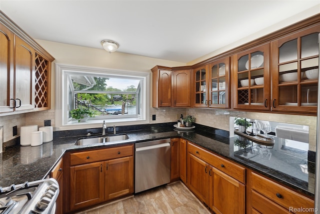 2009 Ridge Rd, White Lake, MI 48383 - kitchen featuring stainless steel dishwasher, stove, glass insert cabinets, decorative backsplash, and brown cabinetry