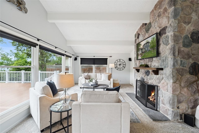 2009 Ridge Rd, White Lake, MI 48383 - carpeted living room featuring a stone fireplace and baseboards