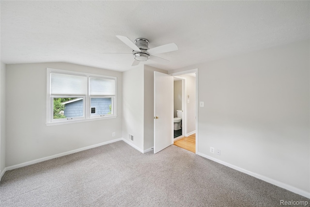 2009 Ridge Rd, White Lake, MI 48383 - carpeted spare room featuring ceiling fan and lofted ceiling