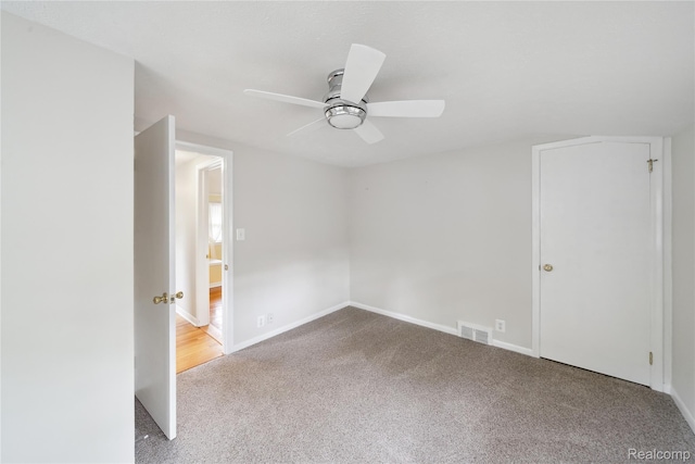 2009 Ridge Rd, White Lake, MI 48383 - spare room with carpet and ceiling fan