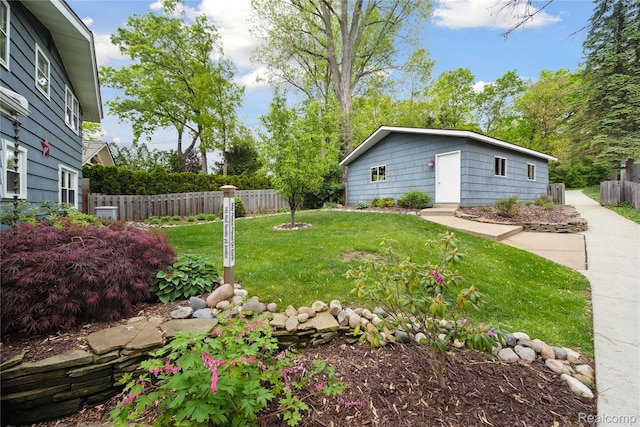 2009 Ridge Rd, White Lake, MI 48383 - view of yard featuring an outbuilding