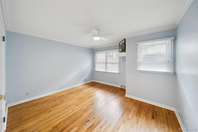 2009 Ridge Rd, White Lake, MI 48383 - empty room featuring light wood finished floors, ceiling fan, and ornamental molding