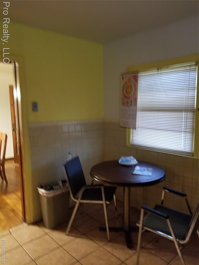 17211 Monica St, Detroit, MI 48221 - dining area featuring wainscoting and light tile patterned floors
