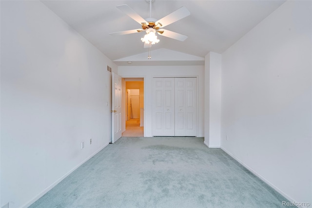 37306 Amhurst Dr, Westland, MI 48185 - unfurnished bedroom with carpet flooring, lofted ceiling, a closet, and a ceiling fan
