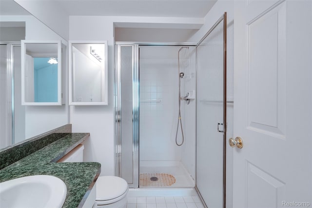 37306 Amhurst Dr, Westland, MI 48185 - full bath with vanity, a stall shower, and tile patterned floors