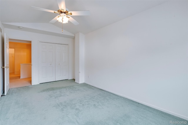 37306 Amhurst Dr, Westland, MI 48185 - unfurnished bedroom with carpet, vaulted ceiling, a closet, and a ceiling fan