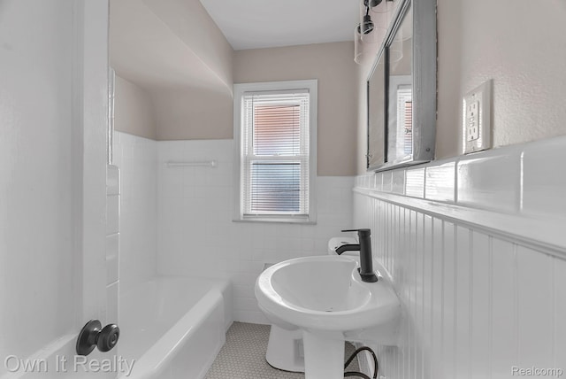 1389 Cleveland Ave, Northville, MI 48146 - full bath with wainscoting and tile patterned floors