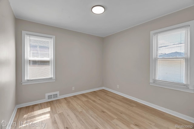 1389 Cleveland Ave, Northville, MI 48146 - spare room featuring light wood-type flooring