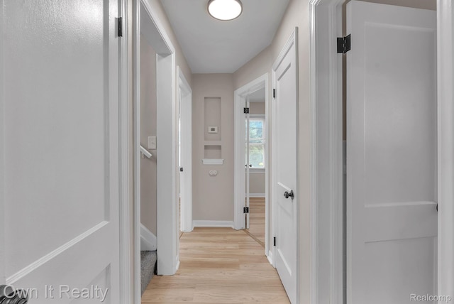 1389 Cleveland Ave, Northville, MI 48146 - corridor featuring light wood finished floors and baseboards