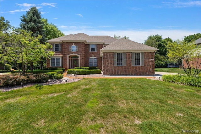 8507 Newbury Ct N, Canton, MI 48187 - colonial inspired home featuring a front yard and brick siding