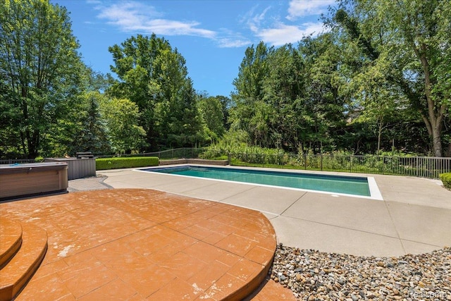 8507 Newbury Ct N, Canton, MI 48187 - view of swimming pool featuring a patio and view of scattered trees
