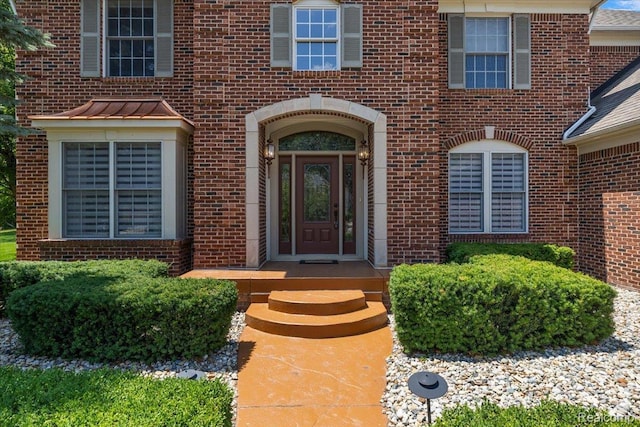 8507 Newbury Ct N, Canton, MI 48187 - view of exterior entry featuring brick siding