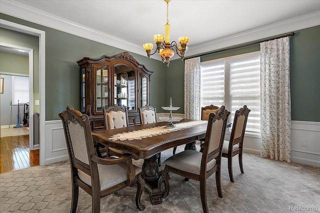 8507 Newbury Ct N, Canton, MI 48187 - dining room featuring a chandelier, a wainscoted wall, and crown molding
