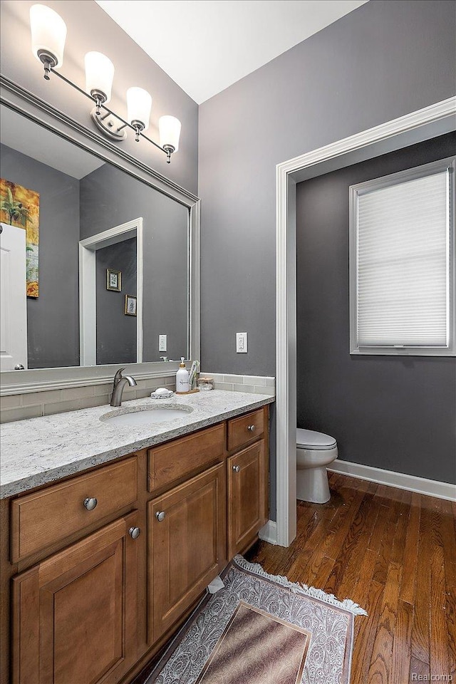 8507 Newbury Ct N, Canton, MI 48187 - bathroom with vanity and wood finished floors