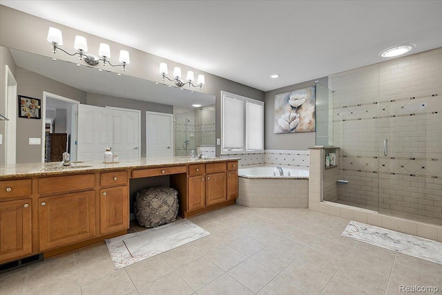 8507 Newbury Ct N, Canton, MI 48187 - bathroom with double vanity, a bath, a shower stall, tile patterned floors, and recessed lighting